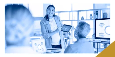 A woman leading discussion in boardroom