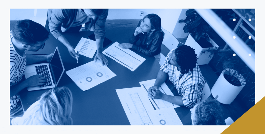 folks around a table during a budgeting meeting